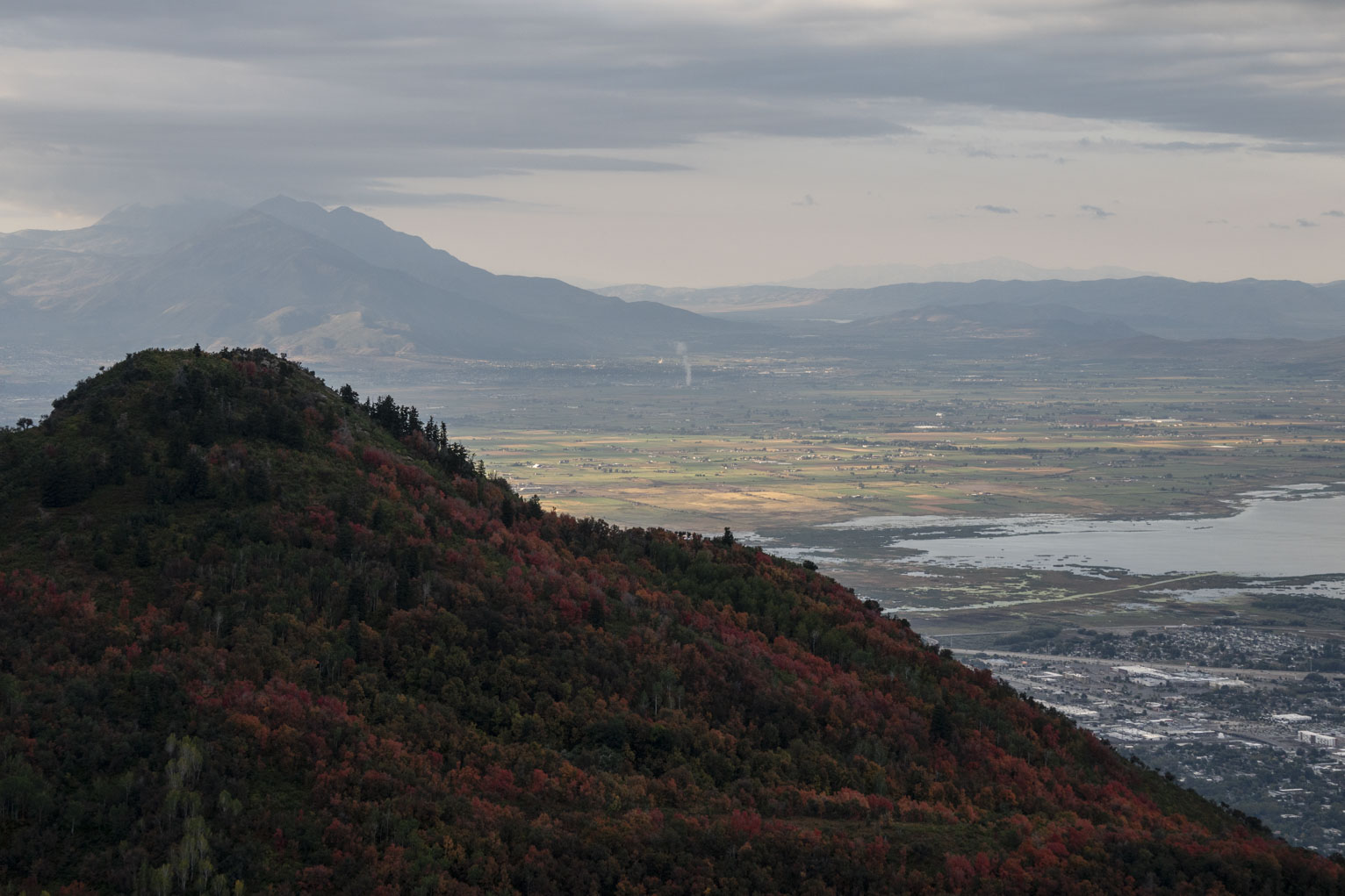 The town, fields, and distant mountains beyond Khyv peak